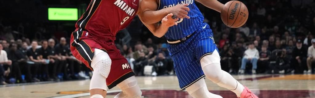 班凯罗31+12阿德巴约21+12 魔术险胜热火